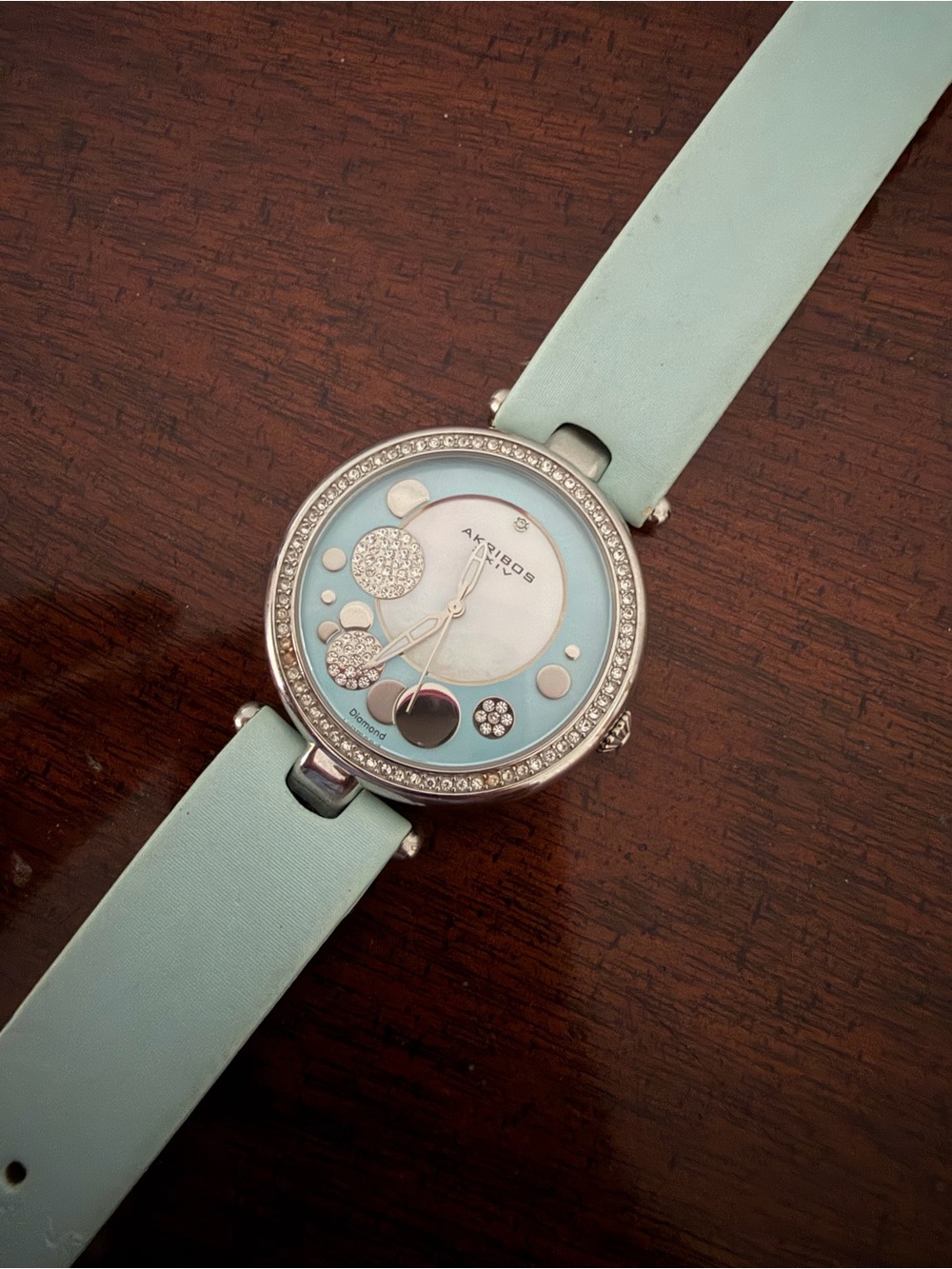 Akribos XXIV Light Blue and Silver Crystal Accent Bracelet Watch